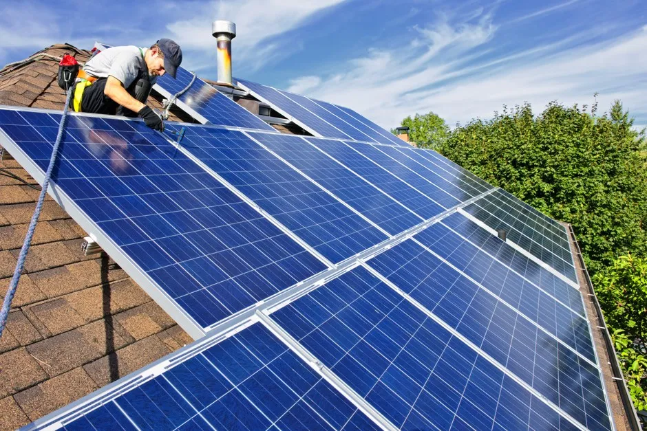 SEAI-registered installer fitting solar PV panels on a house roof in Ireland